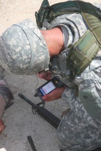 Soldier uses handheld device to capture injury information on the battlefield